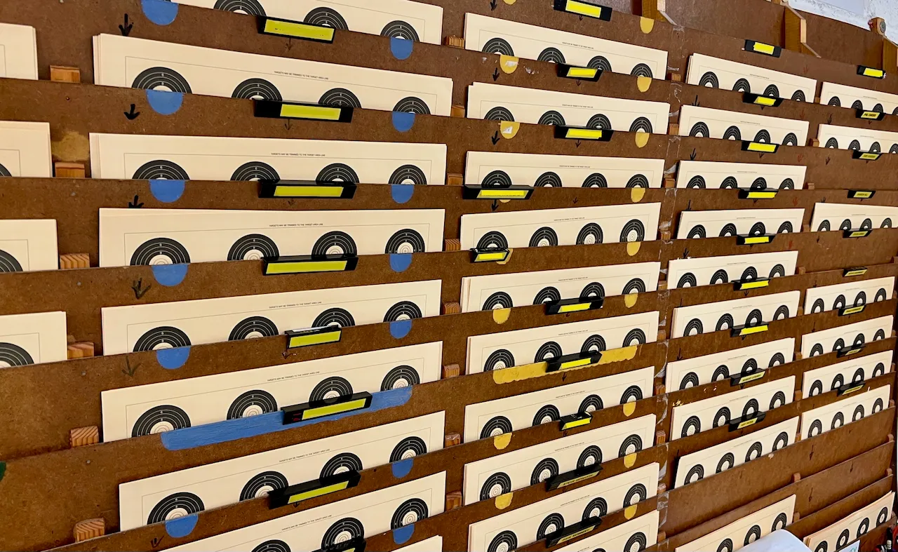 NSRA benchrest score cards in their target slots.
