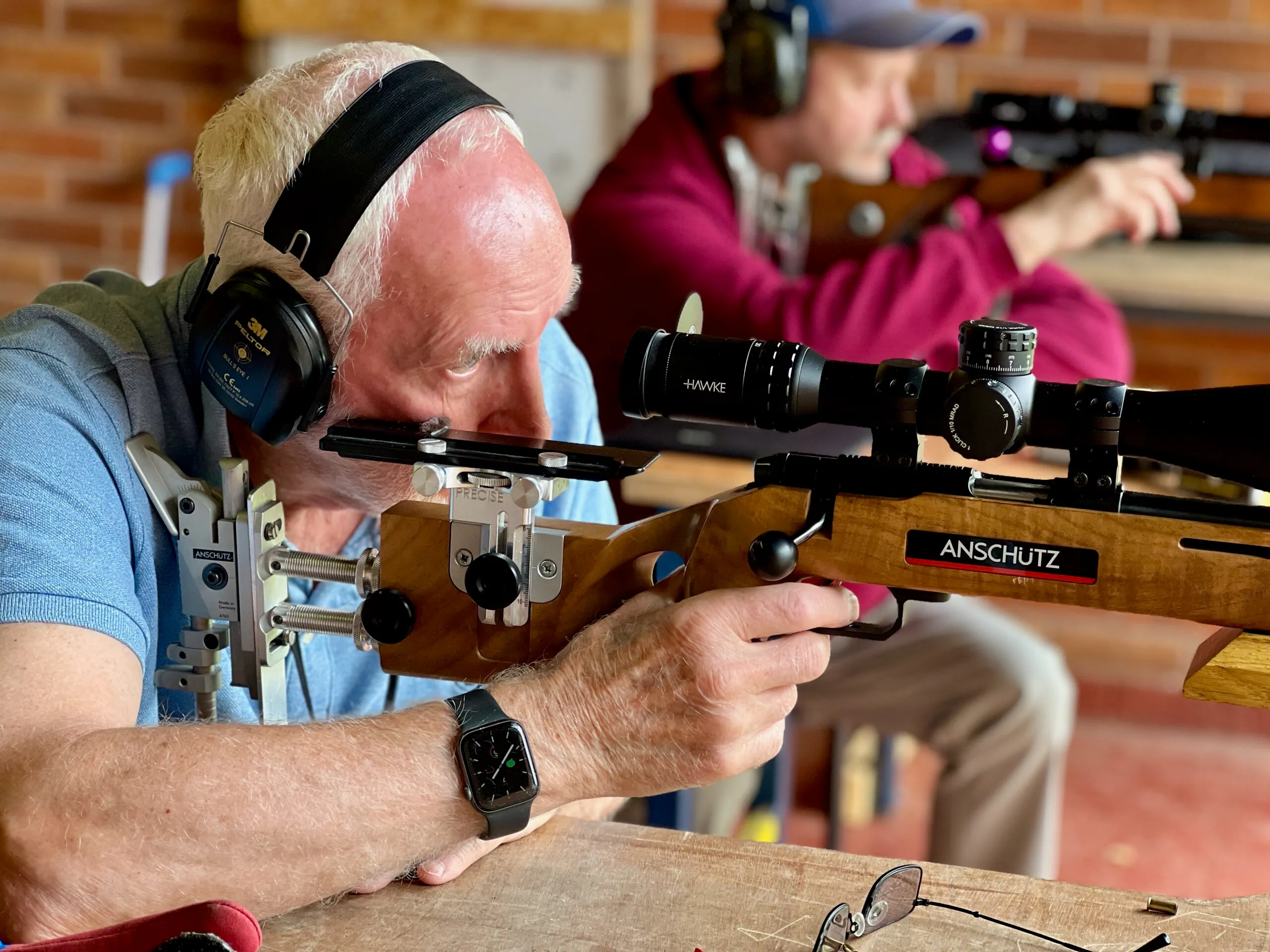 .22LR benchrest rifle on the firing line at Pinhoe TSC, set up on a fore-end rest with a target scope.